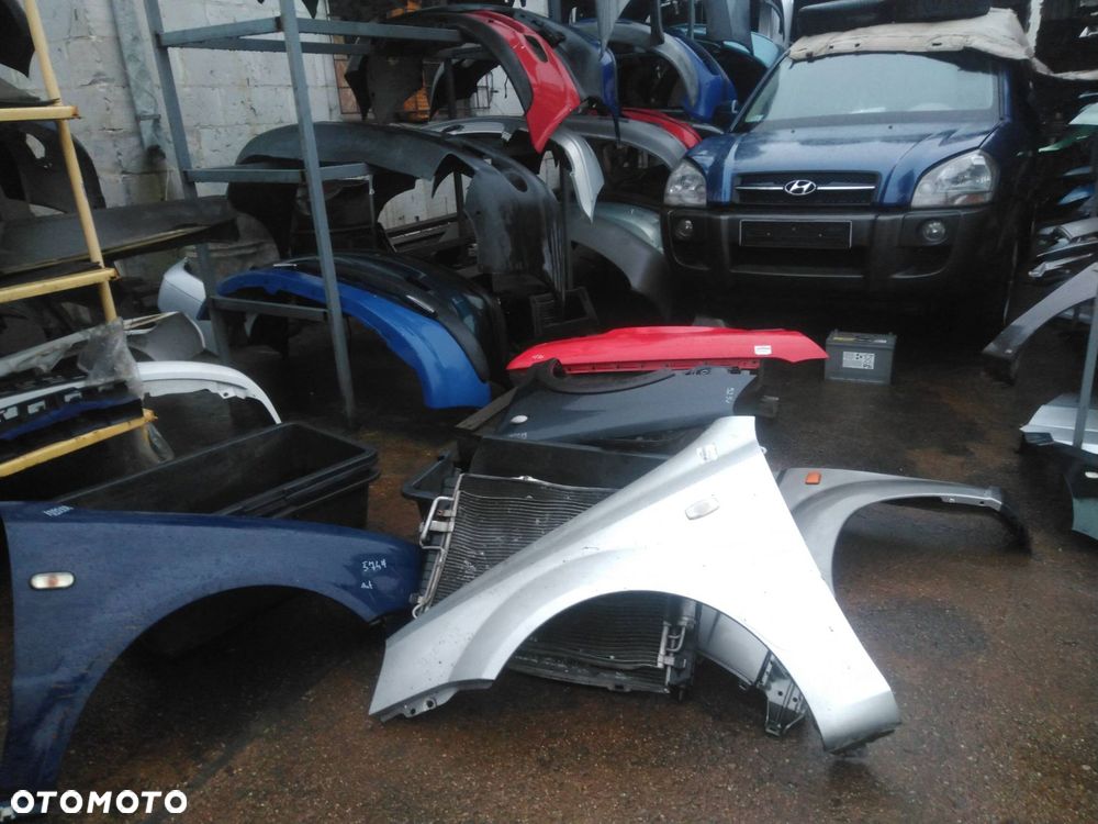 BŁOTNIK LEWY PRZÓD DAEWOO NUBIRA II J200 92U - 10