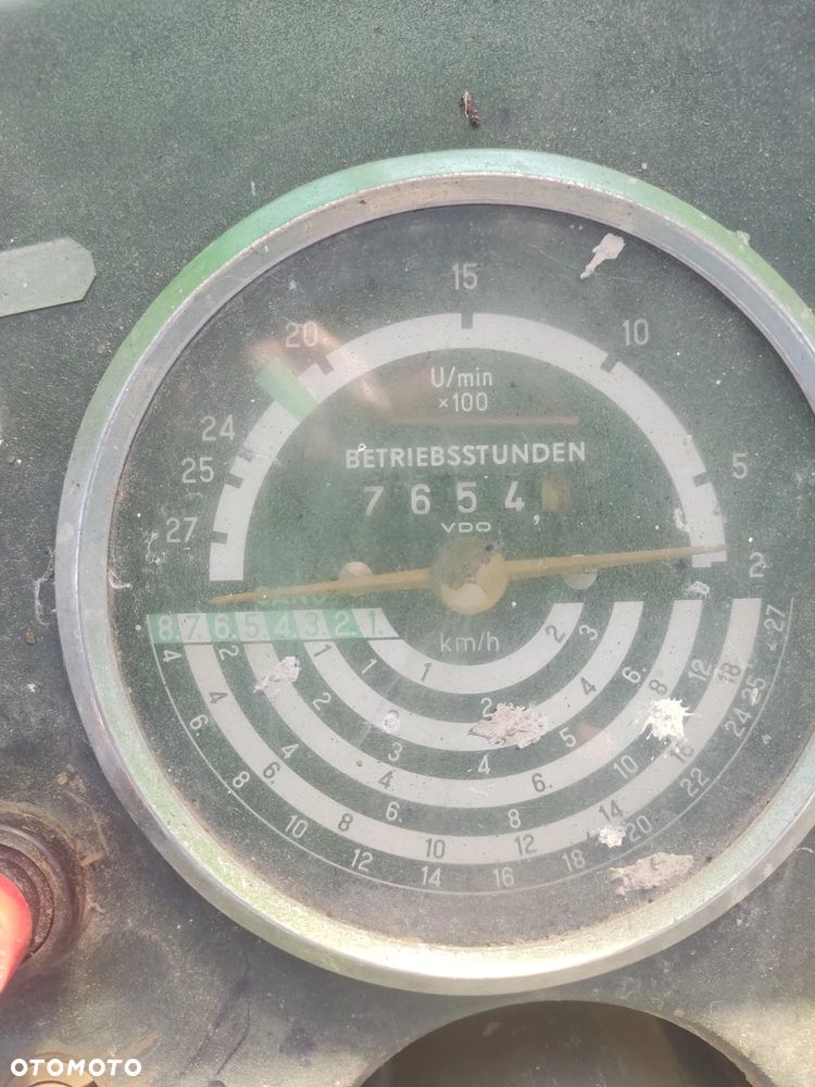 koparko ładowarka John Deere - 7