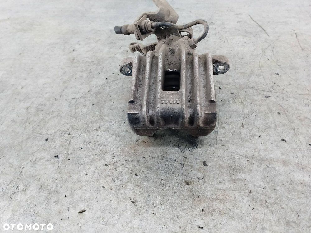 ZACISK HAMULCOWY PRAWY TYŁ VW GOLF V TRW 1.9 TDI - 1