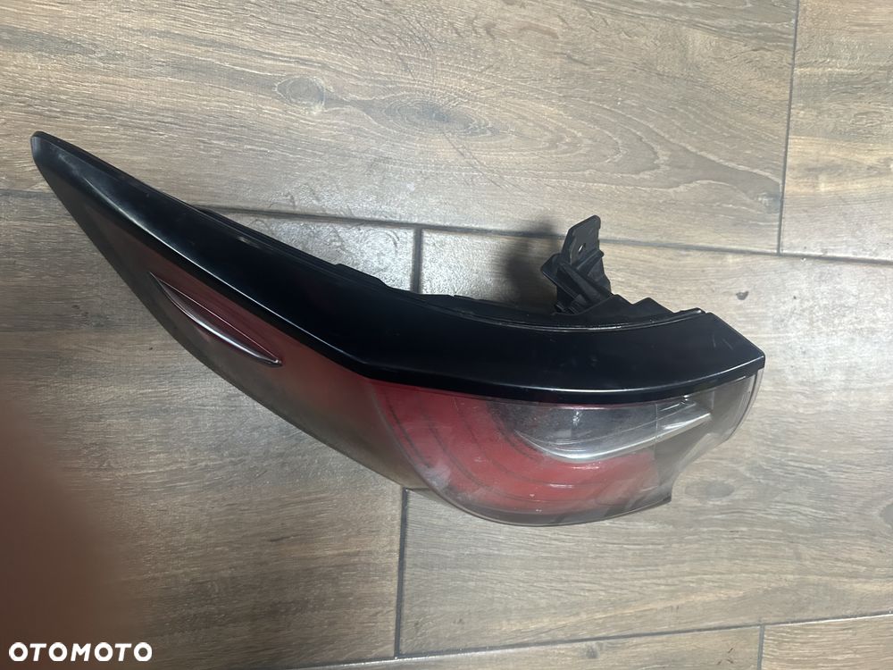 Lampa tylna lewa TOYOTA COROLLA E21 18-22 KOMBI ORG. - 2