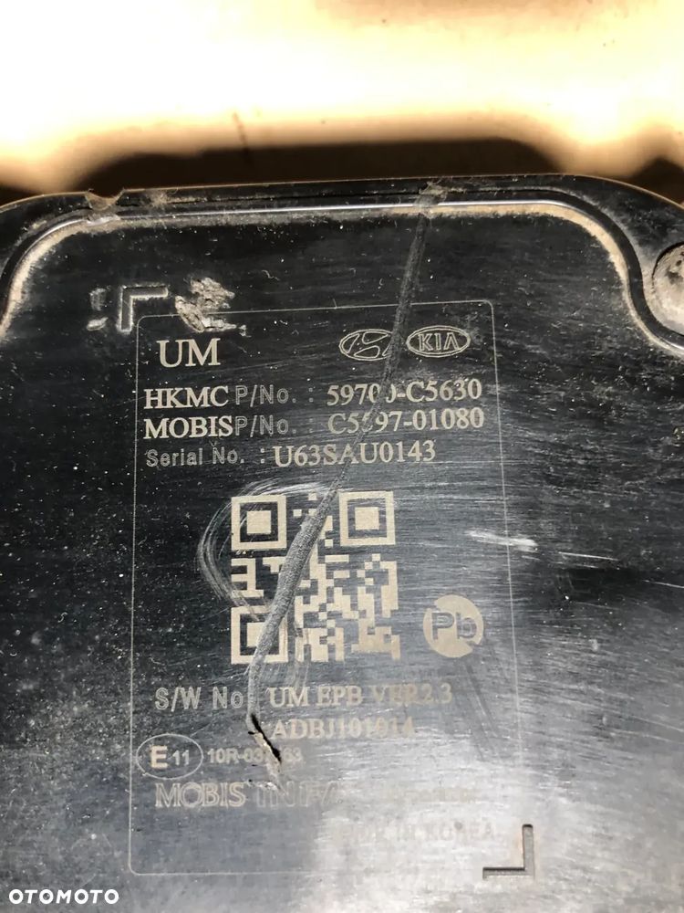 MECHANIZM  HAMULCA RECZNEGO ELEKTRYCZNY KIA SORENTO III 59700-C5630  59700-C5600 gwarancja!!! - 2