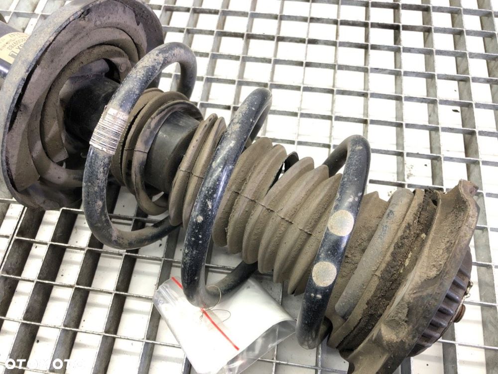 AMORTYZATOR LEWY PRZÓD ZE SPRĘŻYNĄ - 217.00 PLN - OPEL ASTRA K Sports Tourer (B16) 2015 - 2022 - 4