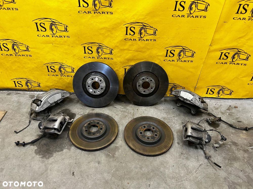 KOMPLET TARCZE ZACISKI KLOCKI HAMULCOWE AUDI A8 D4 - 1