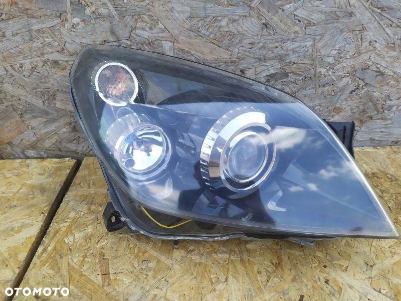 REFLEKTOR PRAWY EU KSENON OPEL ASTRA III H - 1