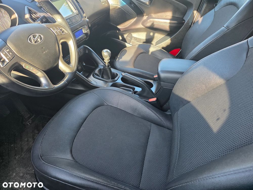 Hyundai ix35 blue 1.6 2WD Finale Gold - 12