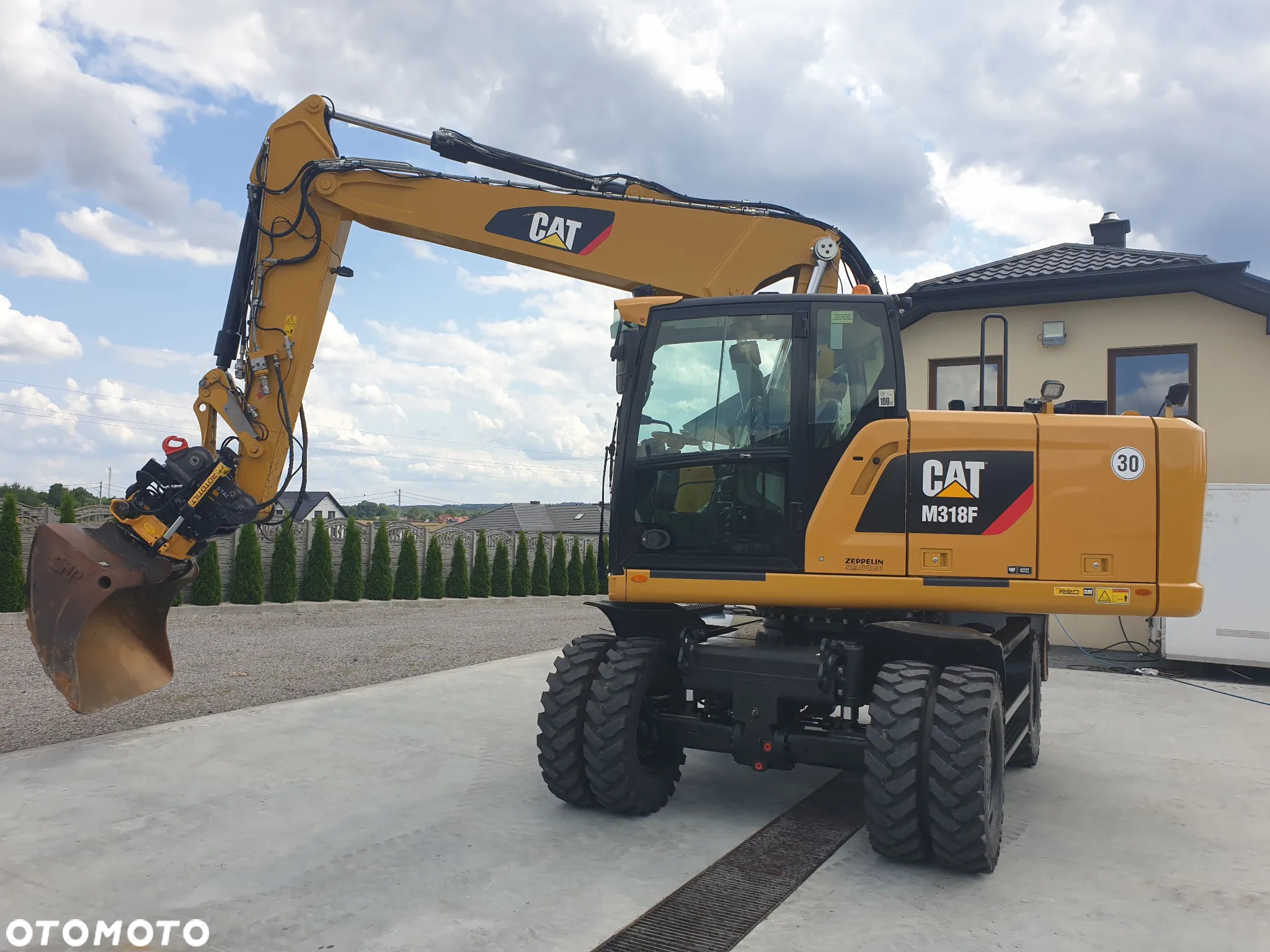 Caterpillar M 318 F ROTOTILT SPROWADZONY ŁADNY STAN - 39