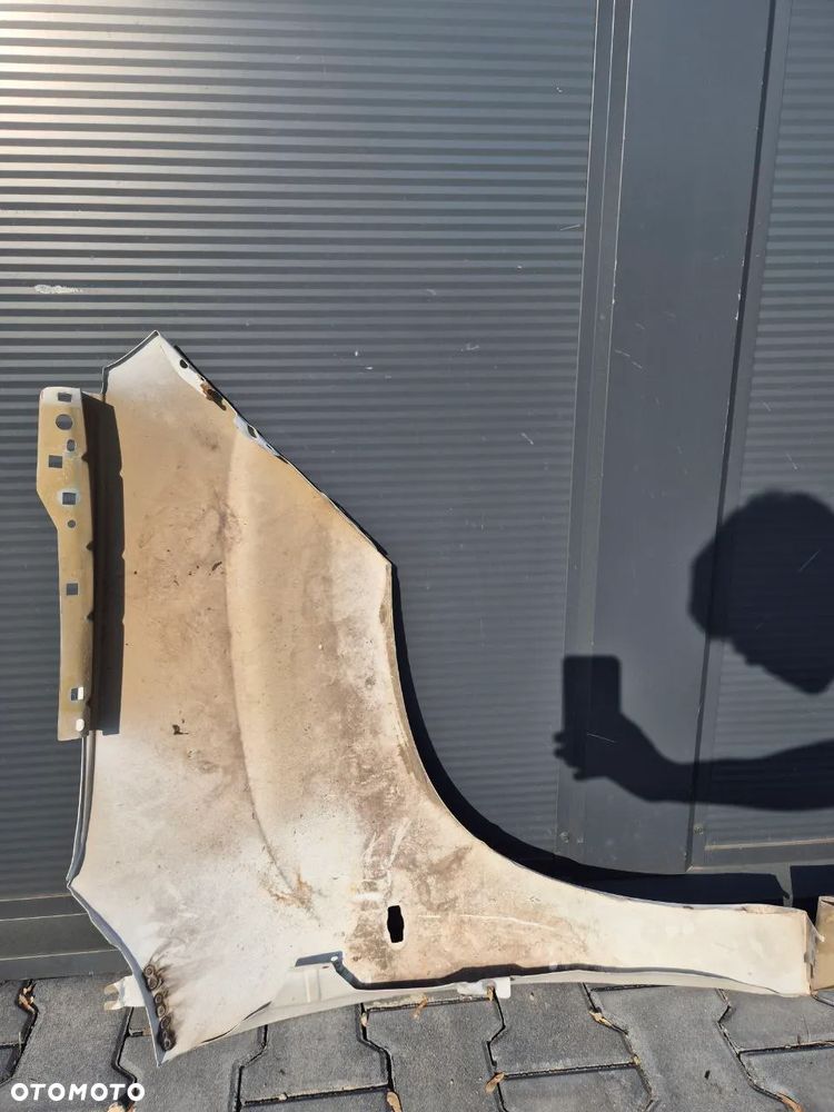 BŁOTNIK CITROEN BERLINGO IV / PEUGEOT PARTNER IV / OPEL COMBO E - 11