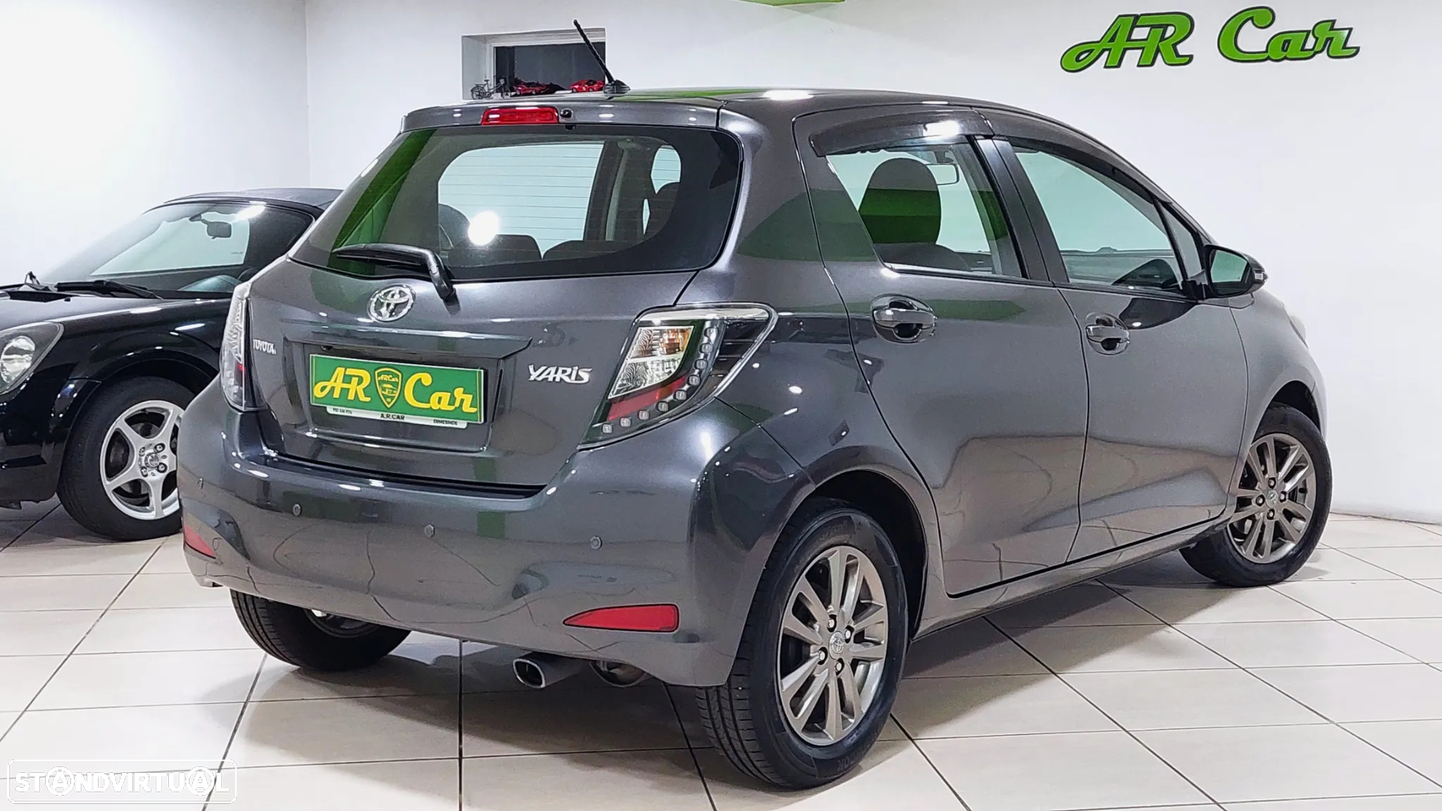Toyota Yaris 1.0 VVT-i Comfort +PS Style +P.Techno - 4