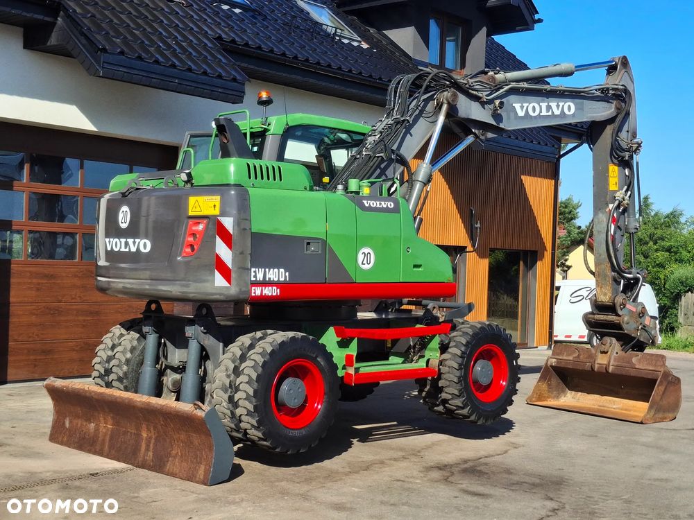 Volvo EW 140D Koparka Kołowa OilQuick Szybkozłącze Podwójne Koła 2015 Rok 2439 MTH Moc: 204 KM Dodatkowa Łyżka Pług Bardzo Dobry Stan Sprowadzona - 19