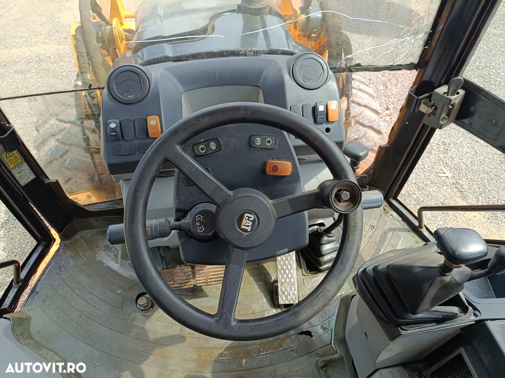 Caterpillar 428E - 12