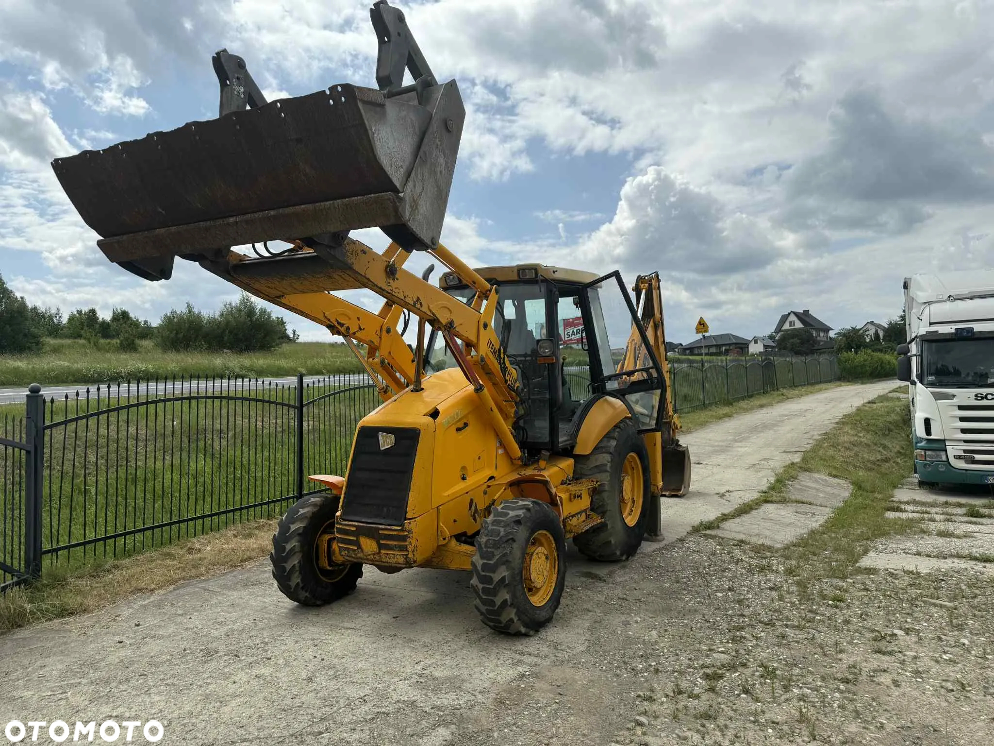 JCB koparko-ładowarka KOMATSU WB97 jcb 3cx - 12