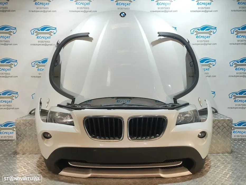 Frente Completa BMW X1 E84 - 2009 a 2015 - Parachoques | Guarda Lamas | Capot | Grelhas | Radiadores | Reforço | Fibra | Oticas | Sensores Estacionamento | Ventilador | S X Drive | Parachoque | Lama | Otica - 2