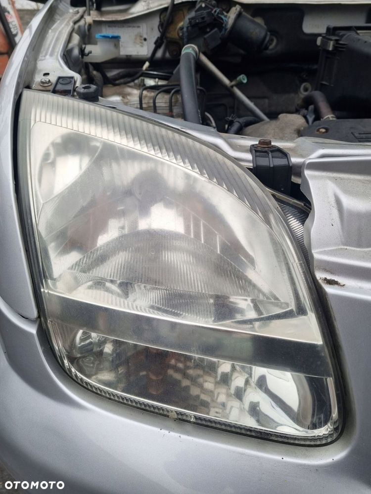 SUBARU JUSTY III G3X 04-07 r. LAMPA PRAWY PRZÓD PRAWA PRZEDNIA PP EU + - 1
