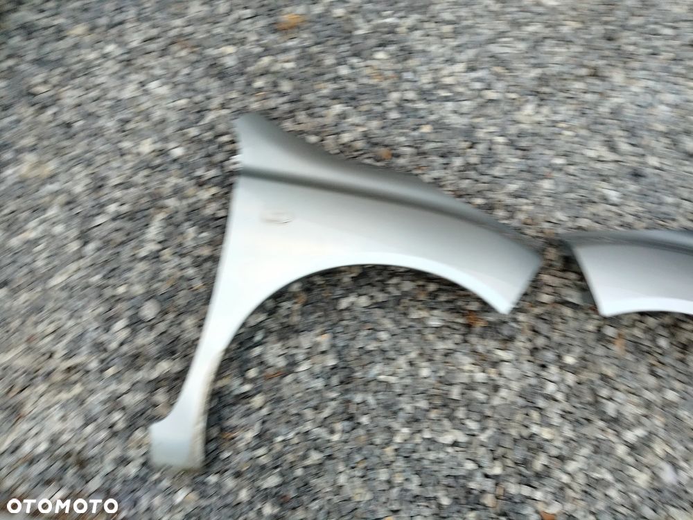 BŁOTNIK LEWY PRAWY NISSAN MICRA K12 KY0 PRZEDLIFT - 2