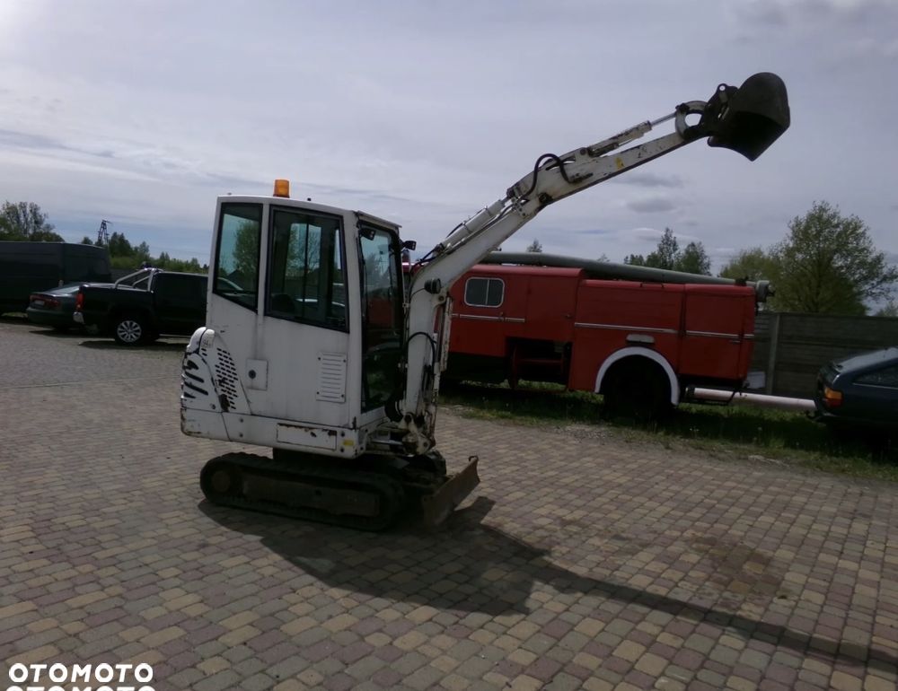 Bobcat x320 minikoparka - 1