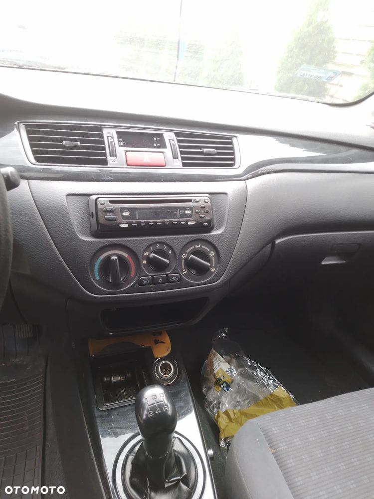 MITSUBISHI LANCER VII KOMBI 1.6 16V 03 - 08  OSŁONA PRZECIWSŁONECZNA PRAWA LEWA - 33