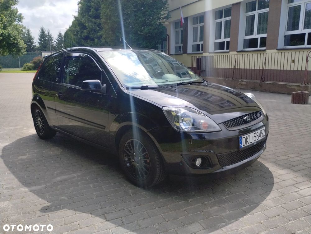 Ford Fiesta 1.4 Ghia - 14