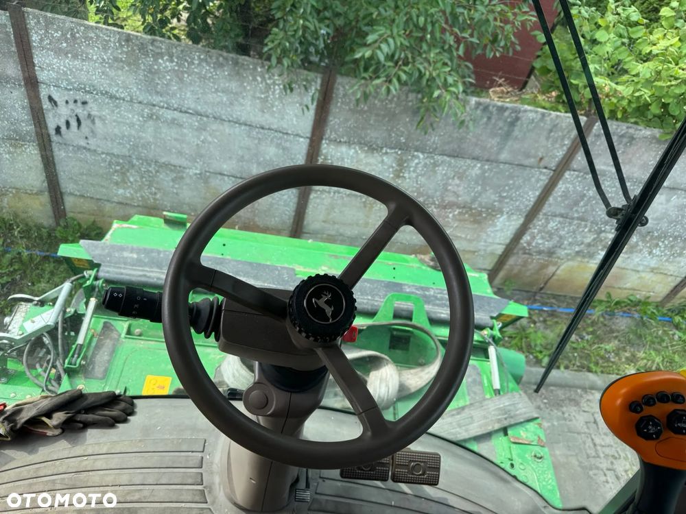 John Deere T670 - 16