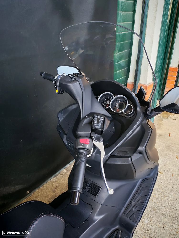 Sym GTS - 5