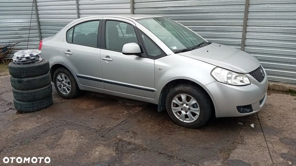 TYLKO CZĘŚCI Suzuki SX4 I 1.6 VVT 16V M16A 79kW 107KM SEDAN 06-09 lakier z2s - 1