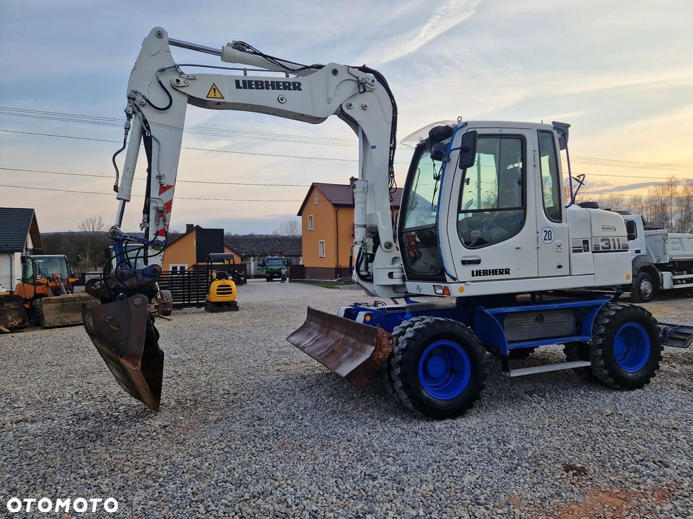 Liebherr A 311 Litronic - 2