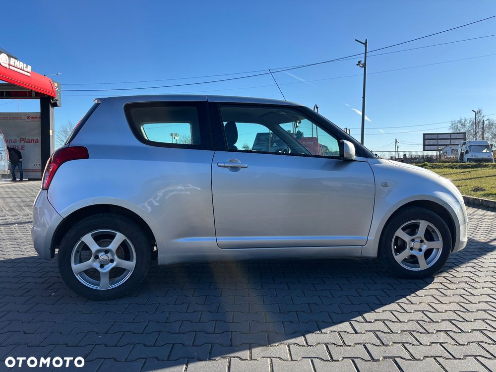 Suzuki Swift 1.3 Club - 8
