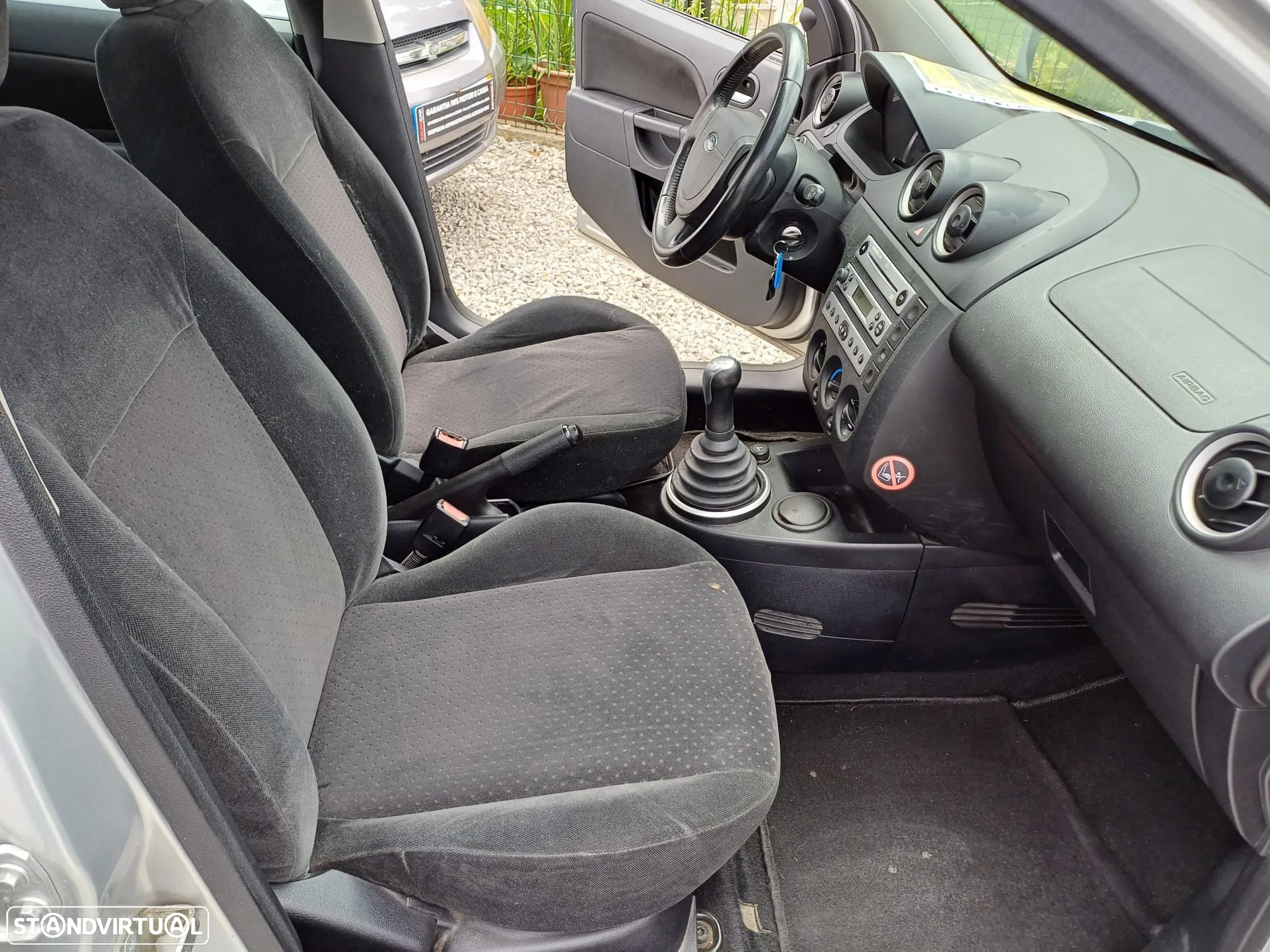 Ford Fiesta 1.25 Ghia - 9
