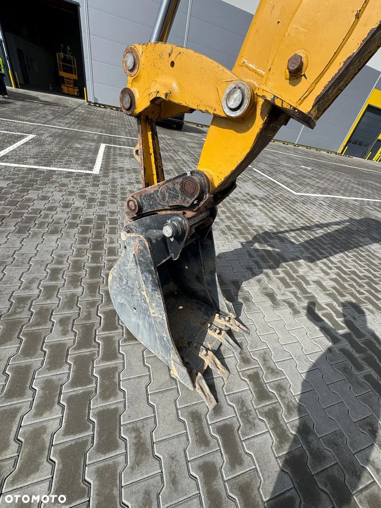 Caterpillar 428 - 25