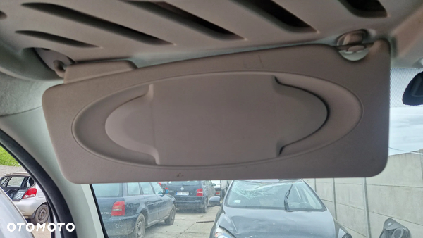 RENAULT KANGOO II 2012r OSŁONA PRZECIWSŁONECZNA LEWA