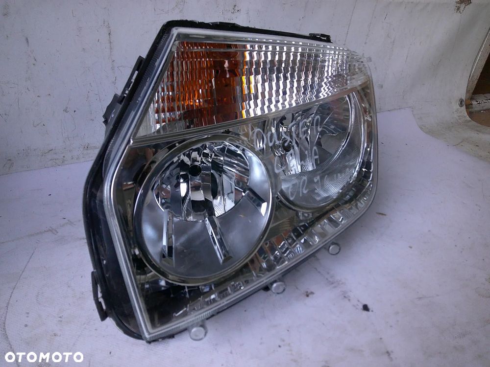 dacia duster i 1 lampa przód lewa nowa oryginał z uszk - 12