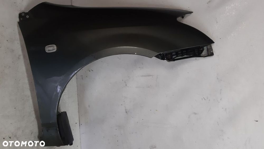* TOYOTA COROLLA E12  BŁOTNIK PRZÓD PRAWY 1G3 - 1