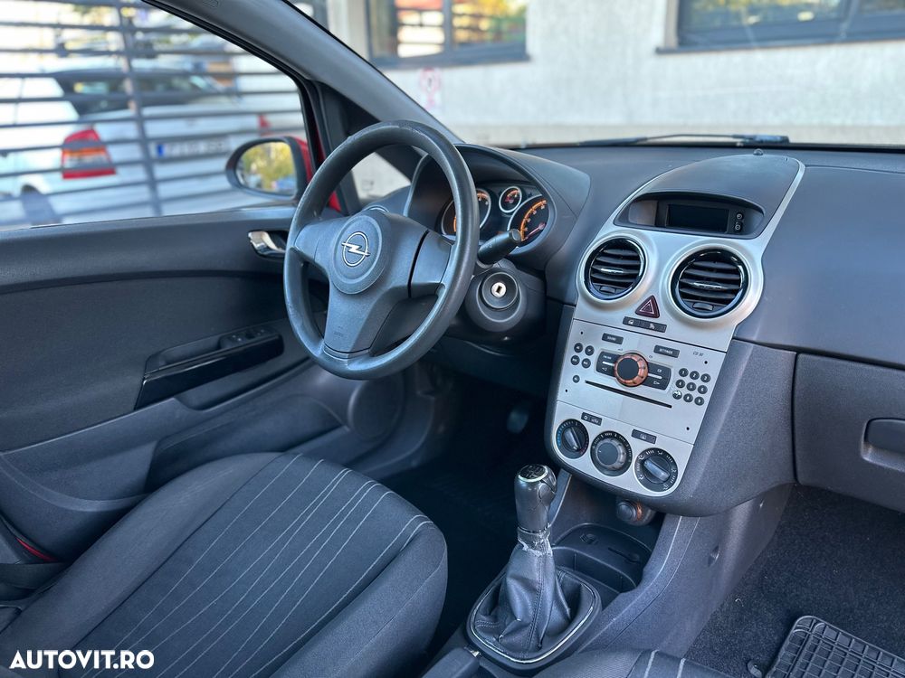 Opel Corsa 1.2i Cosmo - 7