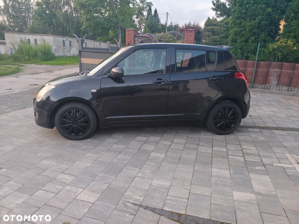 Suzuki Swift 1.3 Club - 9