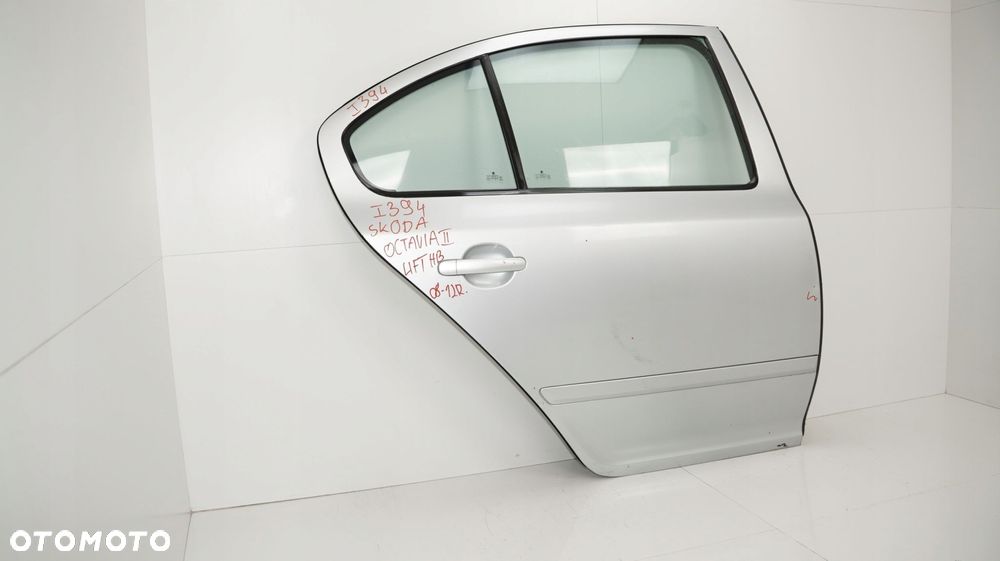 DRZWI PRAWY TYŁ SKODA OCTAVIA II LIFT 08-13R HB LA7W - 2