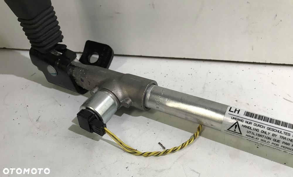 NAPINACZ PASA TYLNY LEWY ORYGINALNY BMW E90 E91 - 2