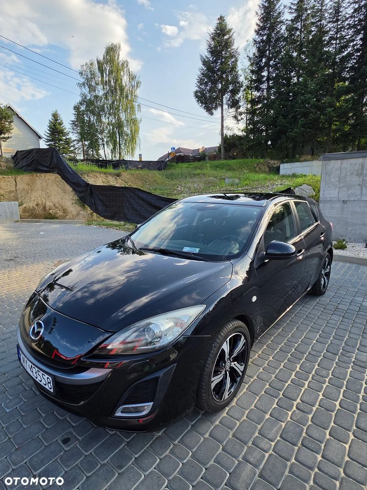 Mazda 3 2.0 MZR DISI Sports-Line - 2