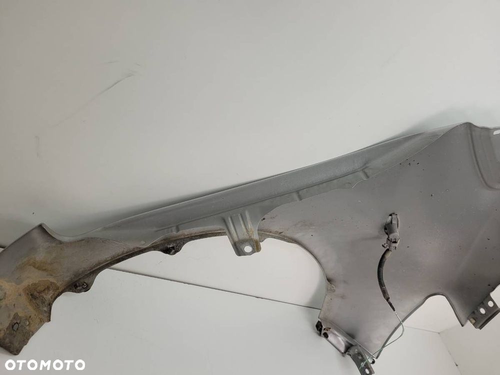 BŁOTNIK PRZÓD LEWY TOYOTA YARIS II 3D 2006 3 DRZWI EUROPA - 11