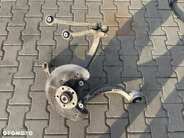 AUDI A6 C7 2.0 TDI ZWROTNICA LEWA PRZÓD 4G0407241D