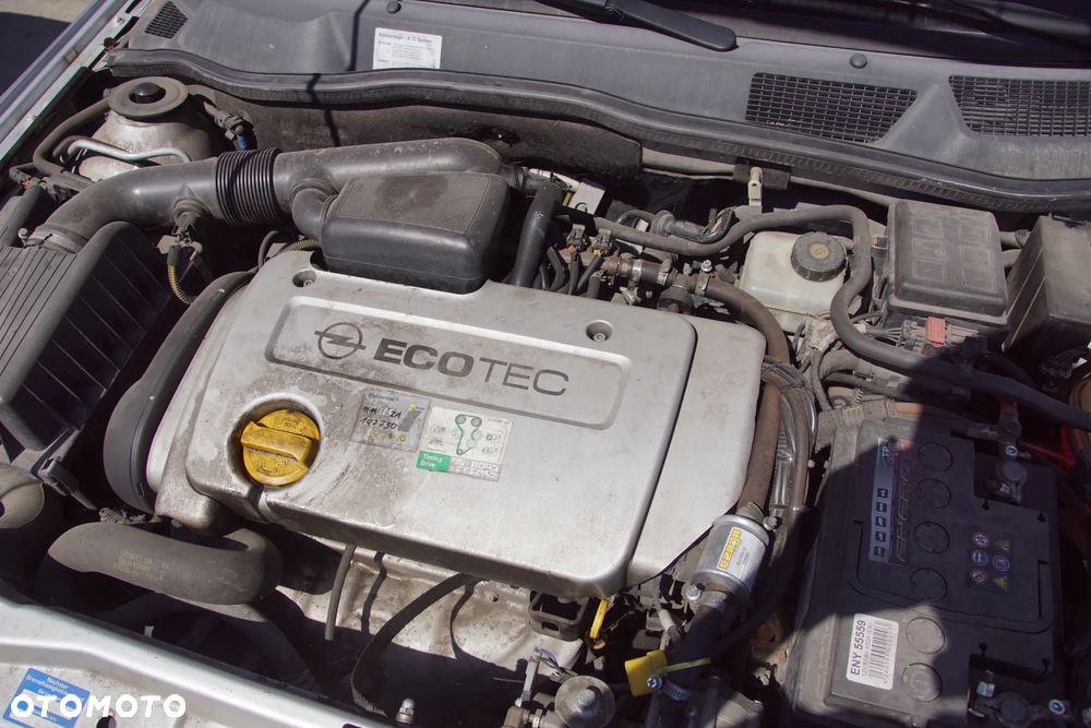 Auto na części - Opel Astra II G 1.6 16V 101 KM Z16XE F17 Z157 2002R Silnik Skrzynia Drzwi Maska Błotnik Zderzak Klapa Lampa Lusterko Klamka Szyba Deska Kokpit Sterownik Moduł Czujnik Licznik Panel Kierownica - 20