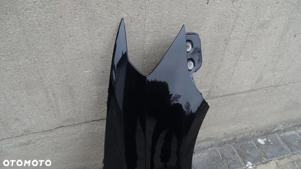 VW CADDY 2K5 15r> - błotnik przedni prawy - 2