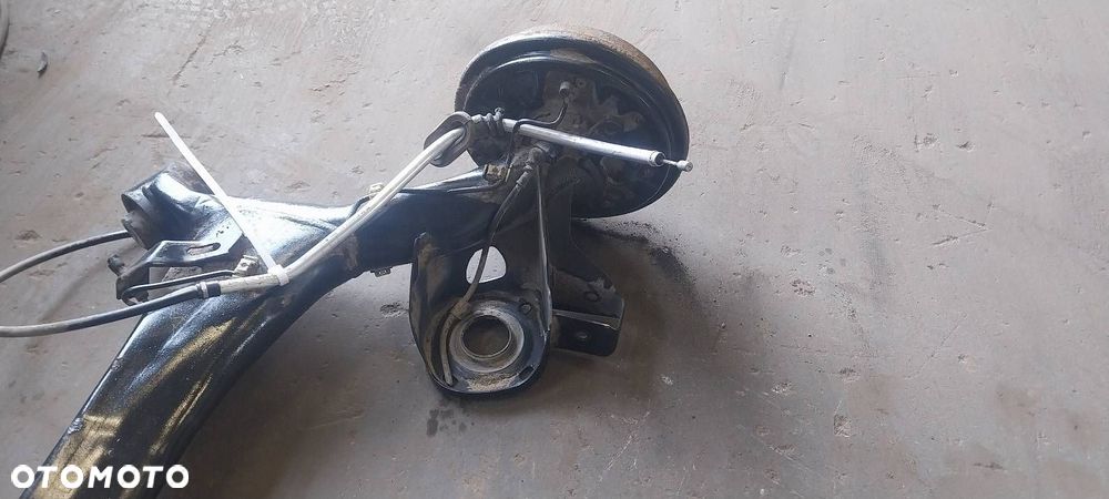 BELKA OŚ ZAWIESZENIA TYŁ BĘBNY Z ABS SKODA FABIA I HB 5D - 2