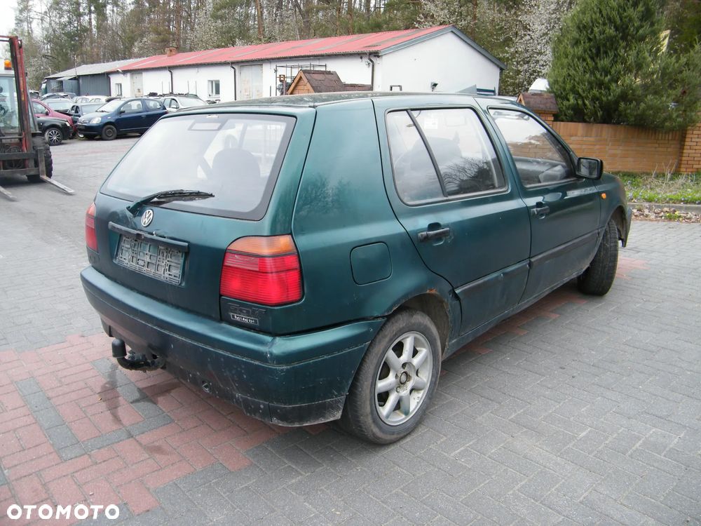 Volkswagen Golf III (91-03r.) 1.4 B 59KM. Silnik AEX Skrzynia DGL lakier LC6P. Cały na części. GWARANCJA !!!  Przód Tył Zestaw Komplet Drzwi Klapa Zderzak Błotnik Maska Grill Atrapa Szyba Pas Lampa Lusterko Boczki Fotel Kanapa Kokpit Deska Rozdzielcza Przełącznik Włącznik Sterownik Przewody Wiązka Instalacja Moduł Komputer Czujnik Listwa Pompa Alternator Wtryski Głowica Rozrusznik Kompresor Sprzęgło Dwumas Silnik Skrzynia ABS Klimatyzacji Paliwa Wspomagania Kolektor Turbina Przepustnica Zawór Chłodnica Koło Hak Belka Sanki Zawieszenie Mcpherson Półoś Amortyzator Wydech Tłumik Zacisk Most - 7