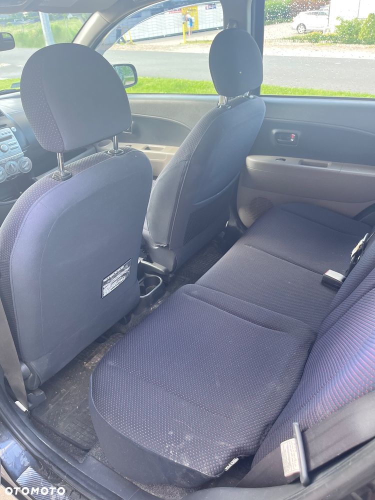 Daihatsu Sirion 1.0 - 8