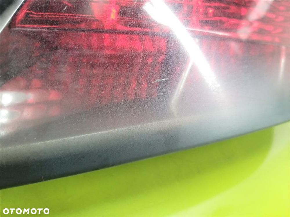 Lampa prawa tylna tył Opel Astra  III H 2004-2013 HELLA 24451834 HB 3 DRZWI - 2