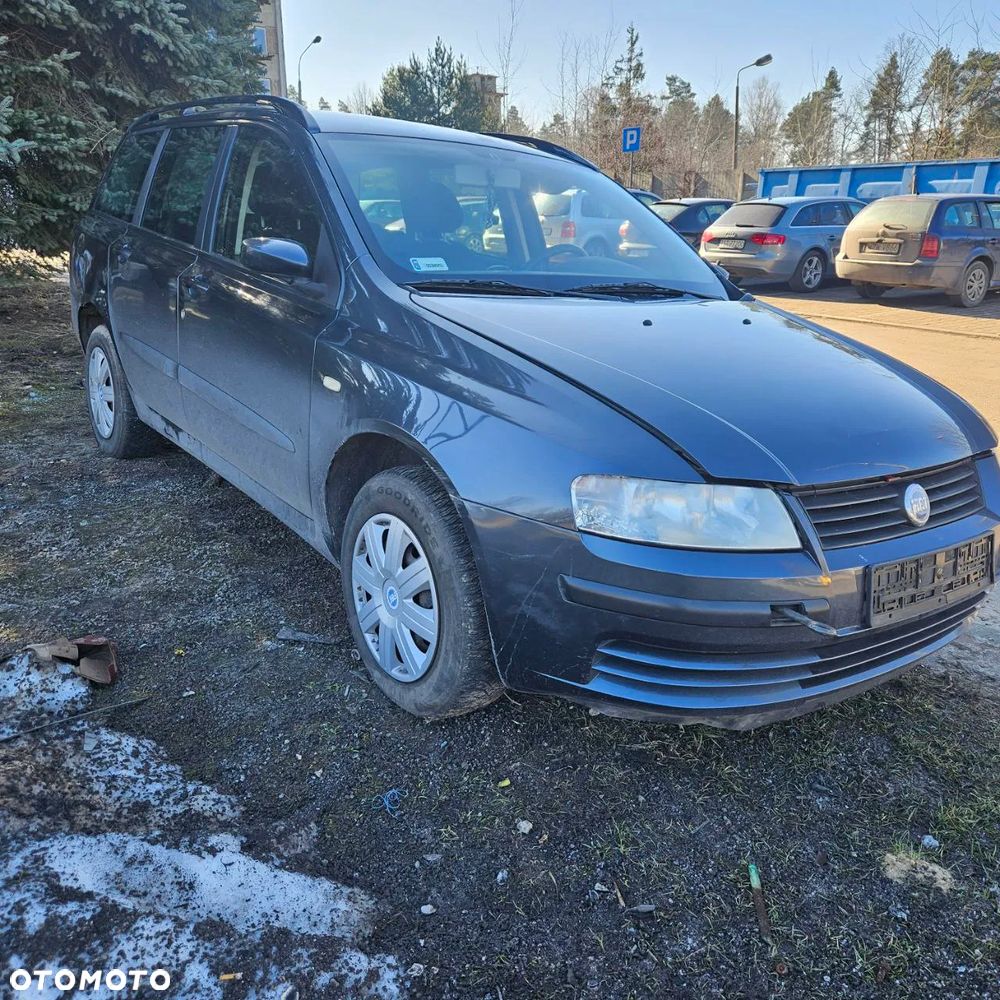 Fiat Stilo 1,6 B 76 kW / 103 KM (2003 kombi) (kod lak: 675) pojazd na części: maska, zderzak, drzwi, szyby, lusterka, chłodnica ... - 28