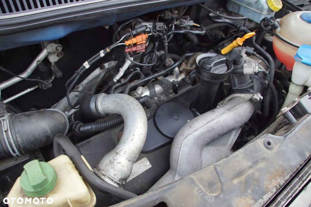 Auto na części - Volkswagen Transporter T5 2.5 TDI 130 KM BNZ KPE LL5M 2008R Silnik Skrzynia Drzwi Maska Klapa Błotnik Zderzak Lampa Szyba Klamka Lusterko Deska Kokpit Sterownik Moduł Czujnik Licznik Wyświetlacz Panel Kierownica - 16