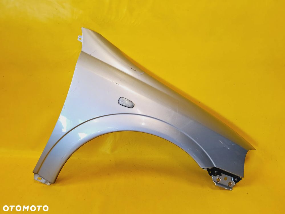 BŁOTNIK PRAWY PRZÓD PRZEDNI OPEL ASTRA II G NR647 - 1
