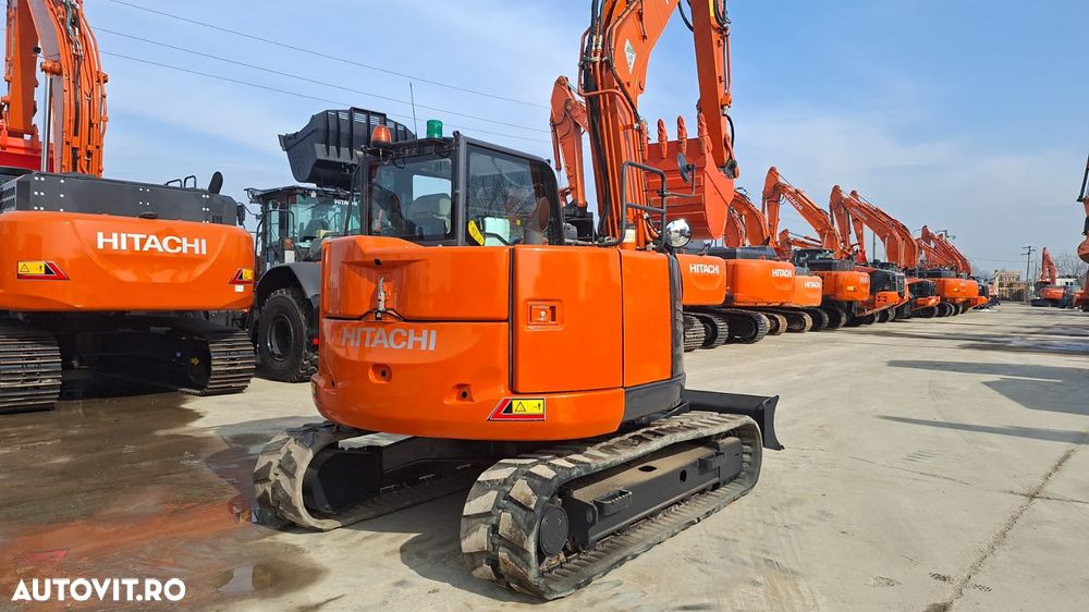 Hitachi ZX85, 2022, 3.339h, CUPLA RAPIDA HIDRAULICA +3 CUPE NOI, senile cauciuc 90%, masa operationala 8,6t, adanc sapare 5m, latime 2,2m, ridica 4,5t, inst picon, LAMA NIVELARE, aer cond, Camera spate, leasing 4 ani, STARE FOARTE BUNA, PROMOTIE 59.900eur+Tv - 1