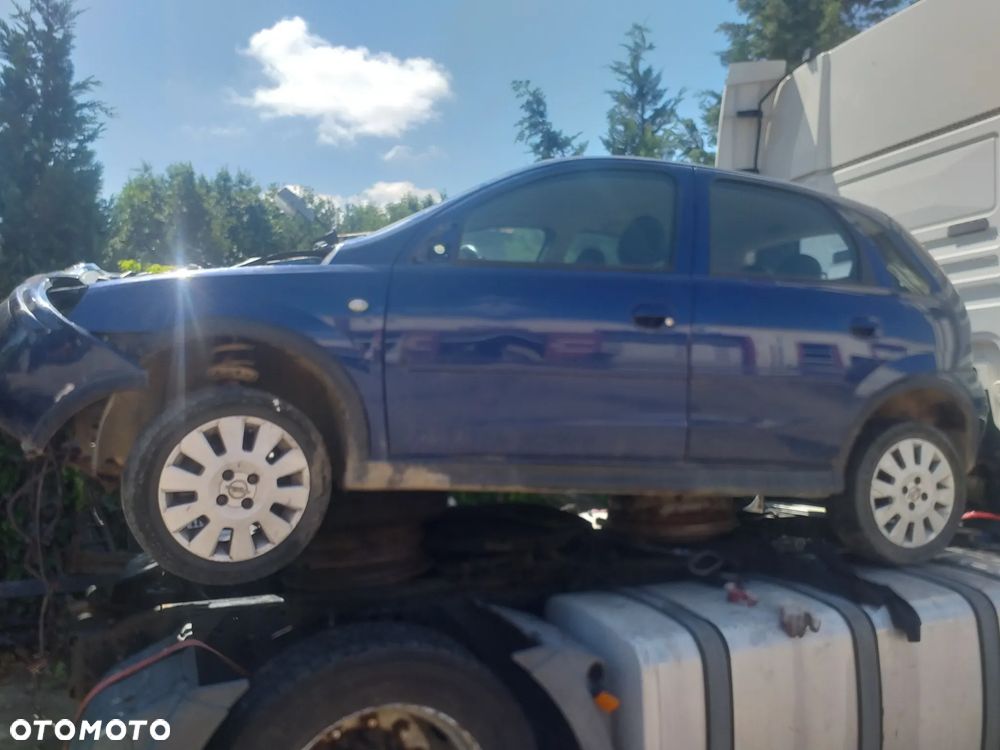 Auto na części - Opel Astra Silnik Skrzynia Drzwi Maska Klapa Błotnik Zderzak Lampa Szyba Klamka Lusterko Deska Kokpit - 1