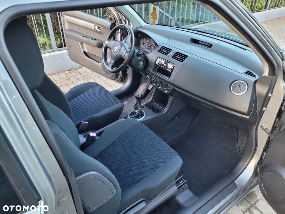 Suzuki Swift 1.3 Club - 12
